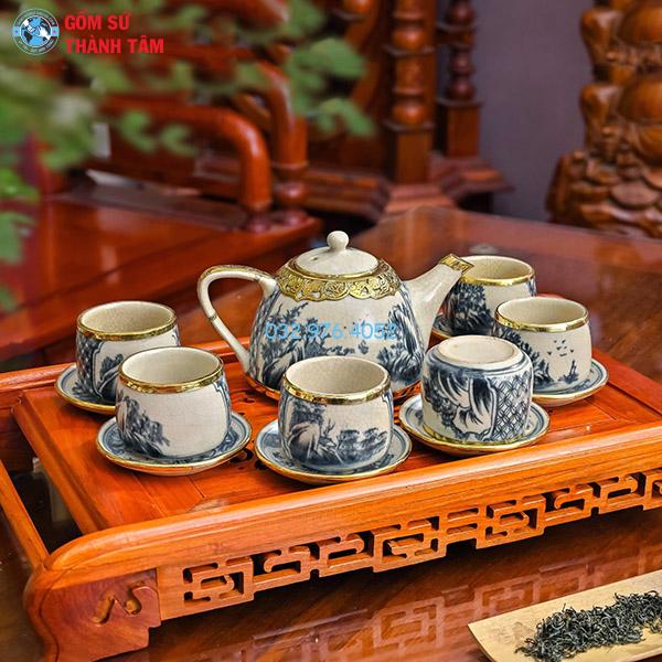 Ấm chén men rạn bọc đồng siêu quai sứ