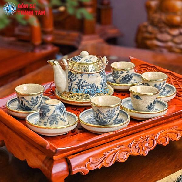 Ấm chén men rạn bọc đồng vuốt