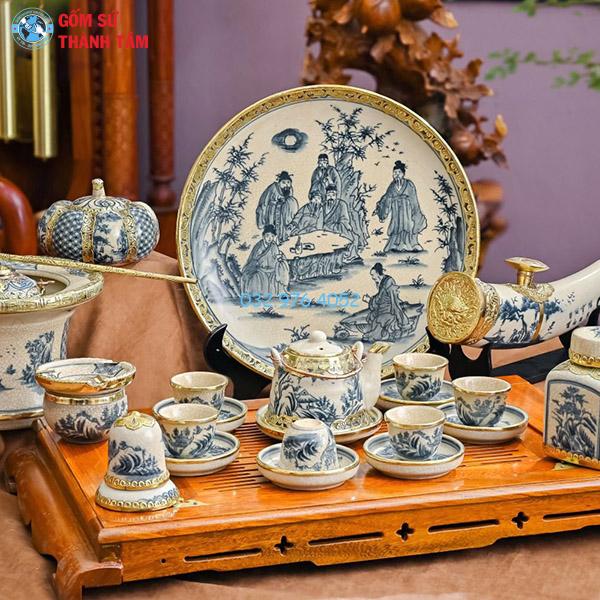 Ấm chén men rạn bọc đồng vuốt