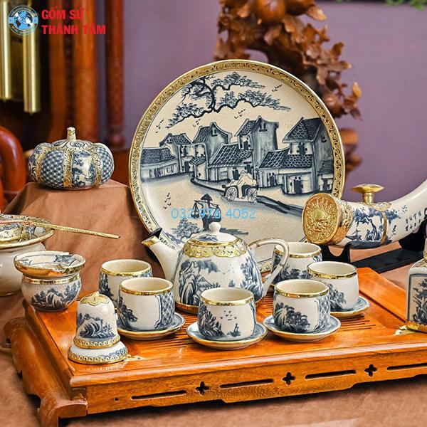 Ấm chén men rạn bọc đồng siêu quai sứ