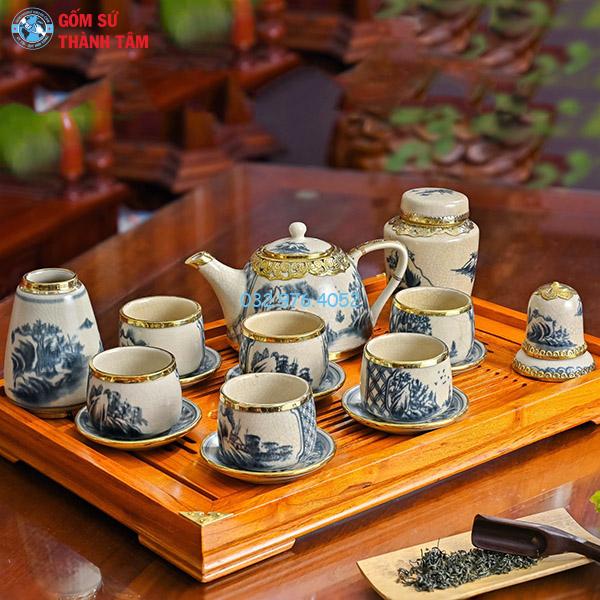 Ấm chén men rạn bọc đồng siêu quai sứ