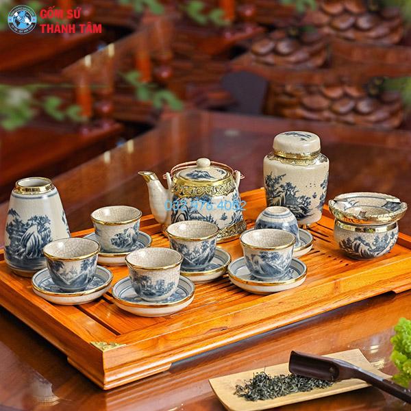 Ấm chén men rạn bọc đồng vuốt